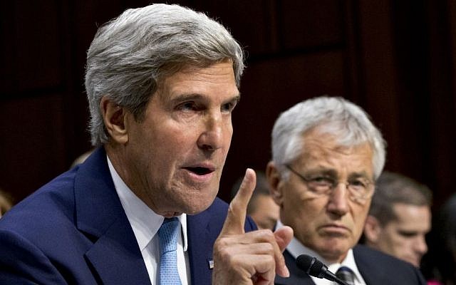 US Defense Secretary Chuck Hagel, right, listens as Secretary of State John Kerry testifies on Capitol Hill in Washington, Tuesday (photo credit: AP/J. Scott Applewhite) US Defense Secretary Chuck Hagel, right, listens as Secretary of State John Kerry testifies on Capitol Hill in Washington, Tuesday (photo credit: AP/J. Scott Applewhite)