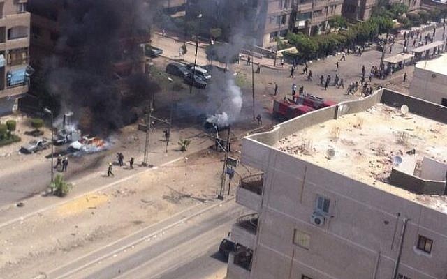 Site of the targeted attack of the Egyptian interior minister September 5, 2013. (Photo credit: Twitter) Site of the targeted attack of the Egyptian interior minister September 5, 2013. (Photo credit: Twitter)