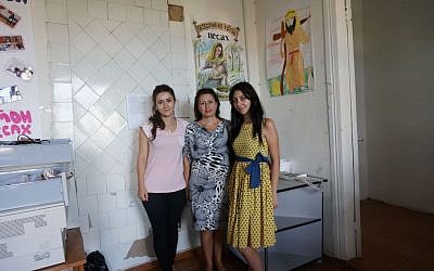 Angela Rubinov, center, with two colleagues from the Jewish nonprofit Atzmaut. (photo credit: Cnaan Liphshiz/JTA)