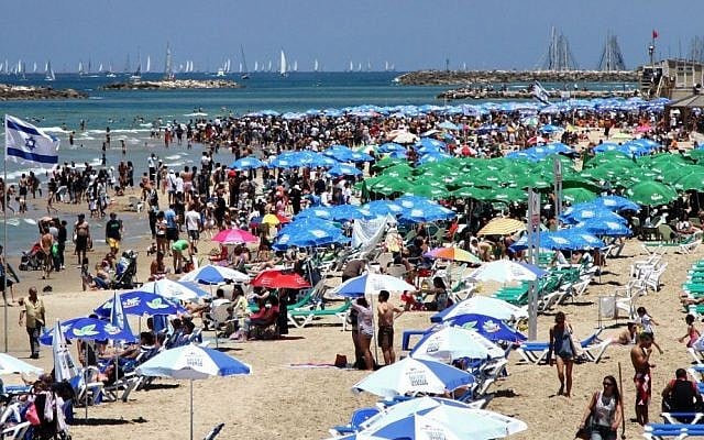 Illustrative photo of a Tel Aviv beach on a sunny day (Nicky Kelvin/Flash90) Illustrative photo of a Tel Aviv beach on a sunny day (Nicky Kelvin/Flash90)