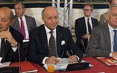 French Defense Minister Jean-Yves Le Driant (left), French Foreign Minister Laurent Fabius (center), and French Prime Minister Jean-Marc Ayrault (right), pose prior to a meeting at Matignon in Paris, on Monday, September 2, 2013. (photo credit: AP/Michel Euler)