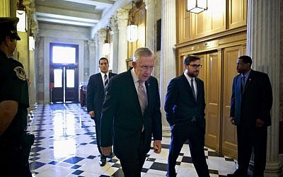 Senate Majority Leader Harry Reid of Nevada makes his way to the Senate floor on Capitol Hill in Washington in September. (photo credit: AP/J. Scott Applewhite)