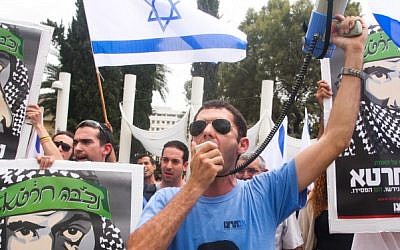 Im Tirzu activists demonstrate during a rally marking the Nakba anniversary at the Tel Aviv University in Tel Aviv, on May 13, 2013. (photo credit: Roni Schutzer/Flash90)