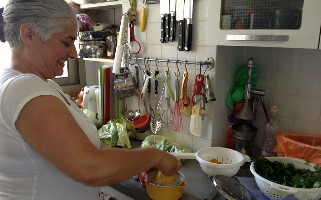 Orly Ziv in her compact but efficient kitchen (photo credit: Jessica Steinberg/Times of Israel) Orly Ziv in her compact but efficient kitchen (photo credit: Jessica Steinberg/Times of Israel)