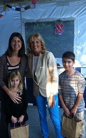Dr. Jill Biden hosts Meredith Englander Polsky and her children Hayden and Lucy in the vice presidential sukkah. (photo credit: Jennifer Laszlo-Mizrahi)