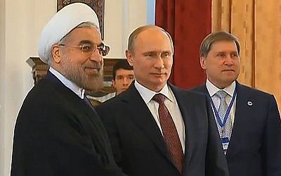 Russian President Vladimir Putin with his Iranian counterpart, Hassan Rouhani,  Friday, September 13, 2013 (photo credit: via YouTube)