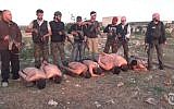 A video released by the New York Times shows Syrian rebels about to execute stripped and bound soldiers loyal to President Bashar Assad (photo credit: @MmeLenvie via Twitter/File)