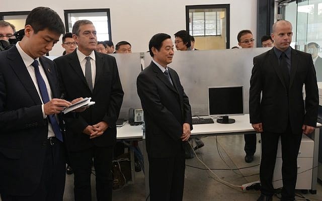 Liu Qibao (center) visits JVP's Media Quarter in Jerusalem (Photo credit: Shmuel Cohen) Liu Qibao (center) visits JVP's Media Quarter in Jerusalem (Photo credit: Shmuel Cohen)