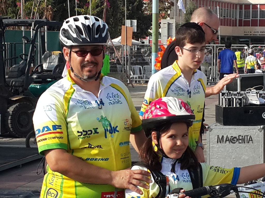 Yisrael and Noam Medina after their Thursday ride (photo credit: Jessica Steinberg/Times of Israel)