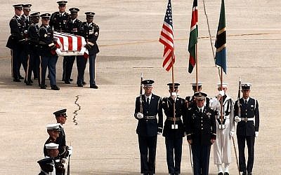 Soldiers of the Army's 3rd Infantry (The Old Guard) carry the remains of a victim of the bombing of the US Embassy in Nairobi, Kenya, to a ceremony at Andrews Air Force Base, Md., on Aug. 13, 1998. (photo credit: Tech. Sgt. Mark A. Suban, US Air Force/DoD).