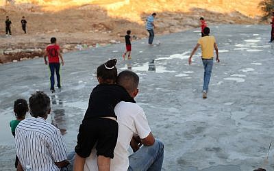 Locals Palestinians at a new park area taking shape near the West Bank village of Bil'in. (photo credit: Haitham Khatib)