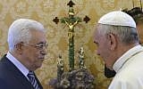 Pope Francis and Mahmoud Abbas talk during their private audience, at the Vatican, on Thursday, October 17, 2013. (photo credit: AP/Maurizio Brambatti, Pool)