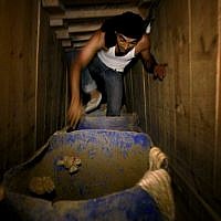A smuggling tunnel between Gaza and Egypt (photo credit: Hatem Moussa/AP) A smuggling tunnel between Gaza and Egypt (photo credit: Hatem Moussa/AP)