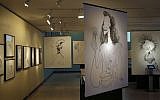Drawings by Al Hirschfeld are displayed in an exhibit on the artist at the Library for the Performing Arts in New York, Wednesday, Oct. 16, 2013. (photo credit: AP Photo/Seth Wenig)