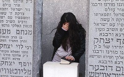 A BMC Seminary student at the Rebbe's grave. (photo credit: Courtesy of DLI Productions)
