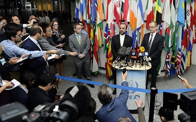 Iran's Ambassador to the International Atomic Energy Agency (IAEA) Reza Najafi, left, and IAEA Deputy Director General and Head of the Department of Safeguards Tero Tapio Varjoranta, right, deliver a statement in Vienna, Austria on Tuesday, Oct. 29, 2013. (photo credit: AP/Hans Punz) Iran's Ambassador to the International Atomic Energy Agency (IAEA) Reza Najafi, left, and IAEA Deputy Director General and Head of the Department of Safeguards Tero Tapio Varjoranta, right, deliver a statement in Vienna, Austria on Tuesday, Oct. 29, 2013. (photo credit: AP/Hans Punz)
