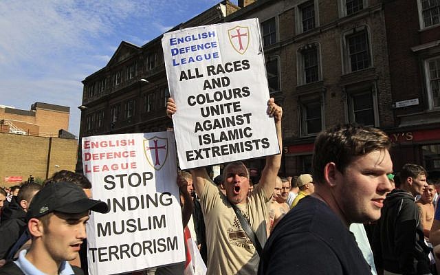 In this Saturday, Sept. 3, 2011 file photo, members of the English Defense League (EDL) gather for a rally in London. (photo credit: AP/Lefteris Pitarakis) In this Saturday, Sept. 3, 2011 file photo, members of the English Defense League (EDL) gather for a rally in London. (photo credit: AP/Lefteris Pitarakis)