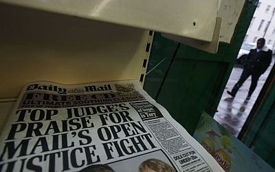 Copies of Britain's Daily Mail newspaper are offered for sale at a newsagent in London, Thursday, Oct. 3, 2013 (photo credit: AP Photo/Lefteris Pitarakis)