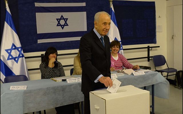 Shimon Peres voting Tuesday morning. (photo credit: Amos Ben Gershom/GPO)