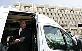 Dani Dankner, former head of Bank Hapoalim, leaving the Bank of Israel in 2009. Dankner was convicted of fraud on Thursday and ordered to pay a hefty fine. (photo credit: Kobi Gideon/Flash90)