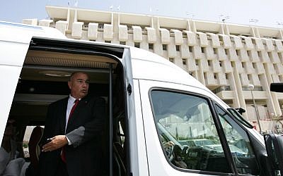 Dani Dankner, former head of Bank Hapoalim, leaving the Bank of Israel in 2009. Dankner was convicted of fraud on Thursday and ordered to pay a hefty fine. (photo credit: Kobi Gideon/Flash90)