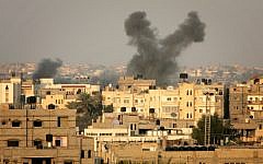 Smoke billows after an Israeli airstrike in the southern Gaza Strip in 2012. (photo credit: Abed Rahim Khatib/Flash 90)