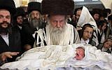 A ritual circumcision ceremony in Jerusalem (photo credit: Yaakov Naumi/Flash90/File)
