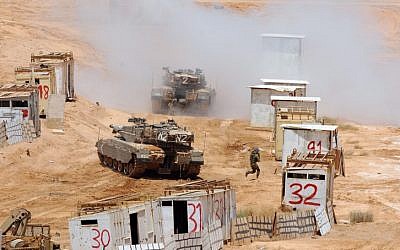 Israeli tanks and soldiers take part in a large combined army drill, June 4, 2013. (photo credit: Tal Manor/IDF Spokesperson/Flash90)