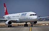 Illustrative: A Turkish Airlines flight on the runway at Ben Gurion International Airport, August 3, 2013. (photo credit: Moshe Shai/Flash90)