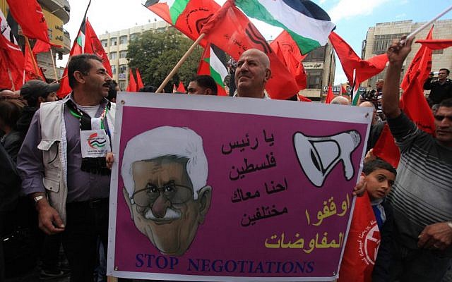 Palestinians rallying against peace talks in Ramallah on October 6, 2013. (photo credit: Issam Rimawi/Flash90) Palestinians rallying against peace talks in Ramallah on October 6, 2013. (photo credit: Issam Rimawi/Flash90)