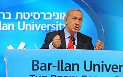 Israeli Prime Minister Benjamin Netanyahu delivers a speech at Bar-Ilan University in Ramat Gan, near Tel Aviv, on October 6, 2013. (photo credit: Reuven Kastro/Flash90)