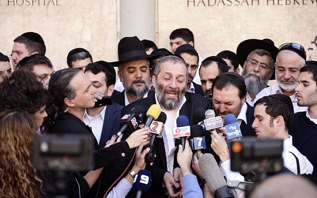 MK Aryeh Deri, who said he felt 'orphaned' by the loss, reacts to Rabbi Ovadia Yosef's death (Photo credit: Flash 90)