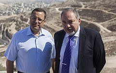 Moshe Lion (L) with Avigdor Liberman during a tour near the Mount Scopus National Park in Jerusalem on October 14, 2013. Photo by Yonatan Sindel/Flash90)