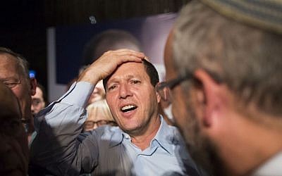 Nir Barkat celebrates with supporters after winning the Jerusalem mayoral elections, early on October 23, 2013 (Photo credit: Yonatan Sindel/Flash90)