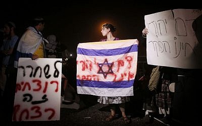 Israelis protesting outside Ofer Prison against previous release (photo credit: Miriam Alster/Flash90)