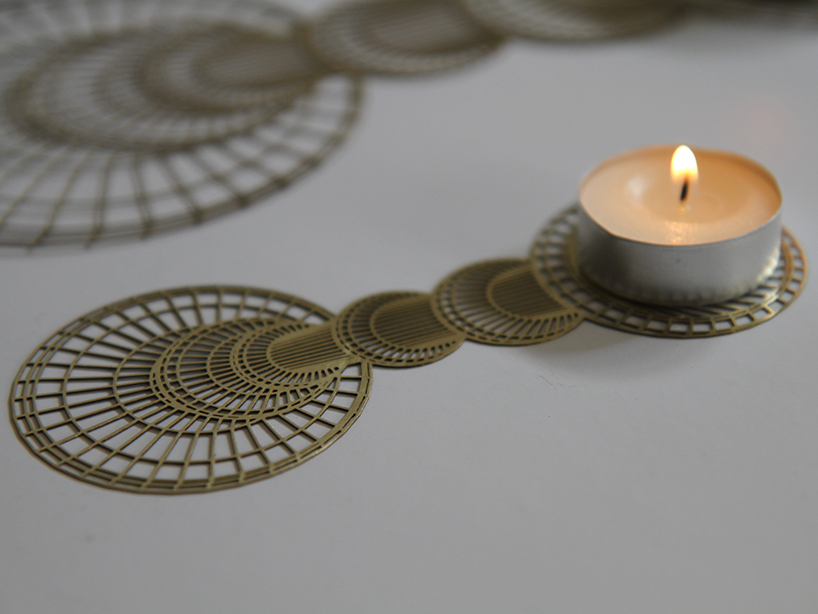 Lighting Shabbat candles in a Flatlight (Courtesy Studio Cheha)