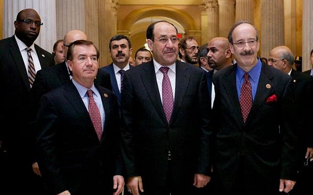Iraqi Prime Minister Nouri al-Maliki, center, walks with ranking members of the House Foreign Affairs Committee, in Washington, DC, Wednesday (photo credit: AP/Molly Riley) Iraqi Prime Minister Nouri al-Maliki, center, walks with ranking members of the House Foreign Affairs Committee, in Washington, DC, Wednesday (photo credit: AP/Molly Riley)