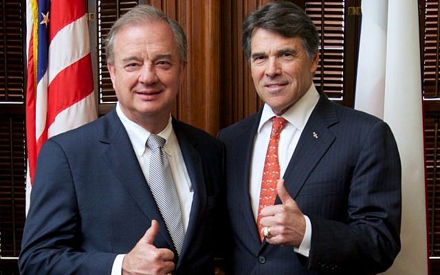 Texas Governor and former Republican presidential candidate Rick Perry, right, posing for a photo with Texas A&M University System Chancellor John Sharp (photo credit: courtesy Texas A&M University) Texas Governor and former Republican presidential candidate Rick Perry, right, posing for a photo with Texas A&M University System Chancellor John Sharp (photo credit: courtesy Texas A&M University)