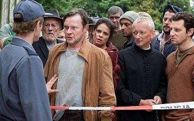 Franek confronting the Town in 'Aftermath.' (photo credit: courtesy)