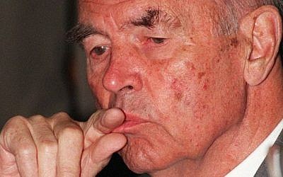 A 1996 file photo, showing former Nazi officer, Erich Priebke, attending an hearing of his trial at the tribunal in Rome. Erich Priebke, an ex SS captain sentenced to life for the 1944's Ardeatine caves massacre in Italy, died at 100. (Photo credit: AP /Giulio Broglio, File)