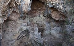 A recycling site in a cave near Zichron Yaakov. (photo credit: AP/Dan Balilty)