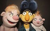 Israel Electric Corporation puppets, Sheka, Teka and a baby puppet used in its latest public service campaign. Sheka and Teka, or “socket” and “plug,” have starred in the company’s ads for more than a decade. (photo credit: AP/Yossi Weiss, Israel Electric Corporation, HOPD)