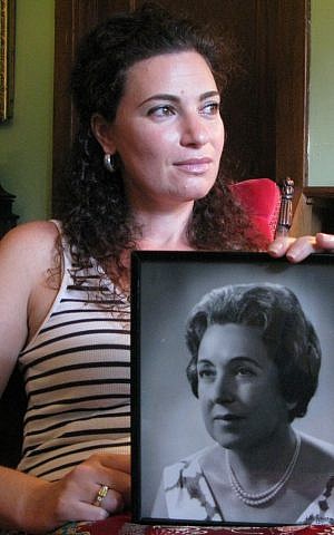 'The Pin' director Naomi Jaye holding a photo of her grandmother, Leah Jaye, who had asked that she be pricked with a pin upon her death. (photo credit: Ronit Novak/Courtesy of Naomi Jaye) 'The Pin' director Naomi Jaye holding a photo of her grandmother, Leah Jaye, who had asked that she be pricked with a pin upon her death. (photo credit: Ronit Novak/Courtesy of Naomi Jaye)
