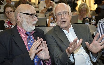 Belgian physicist Francois Englert, left, and British physicist Peter Higgs, right, at the European Organization for Nuclear Research (CERN) in Meyrin near Geneva, Switzerland, on Wednesday, July 4, 2012. (photo credit: AP Photo/Keystone/Martial Trezzini)