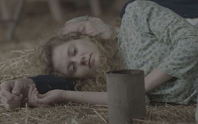 Milda Gecaite and David Fox (who plays the shomer) in 'The Pin'. (photo credit: Courtesy of Main Street Films) Milda Gecaite and David Fox (who plays the shomer) in 'The Pin'. (photo credit: Courtesy of Main Street Films)