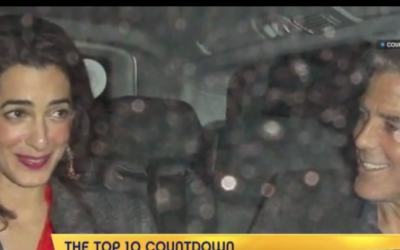 Amal Alamuddin with George Clooney (photo credit: YouTube screenshot)