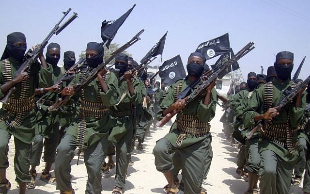 Al-Shabaab fighters march with their weapons during military exercises on the outskirts of Mogadishu, Somalia, in 2011. (AP/Mohamed Sheikh Nor) Al-Shabaab fighters march with their weapons during military exercises on the outskirts of Mogadishu, Somalia, in 2011. (AP/Mohamed Sheikh Nor)