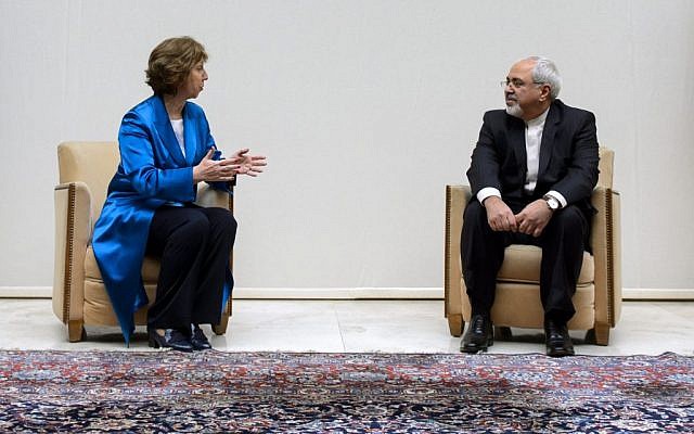 EU High Representative for Foreign Affairs Catherine Ashton, left, talks to Iranian Foreign Minister Mohammad Javad Zarif, right, during a photo opportunity prior to the start of two days of closed-door nuclear talks on Tuesday, October 15, 2013. (photo credit: AP/Fabrice Coffrini, pool) EU High Representative for Foreign Affairs Catherine Ashton, left, talks to Iranian Foreign Minister Mohammad Javad Zarif, right, during a photo opportunity prior to the start of two days of closed-door nuclear talks on Tuesday, October 15, 2013. (photo credit: AP/Fabrice Coffrini, pool)