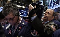 Wall Street traders on Thursday (photo credit: AP/Richard Drew)