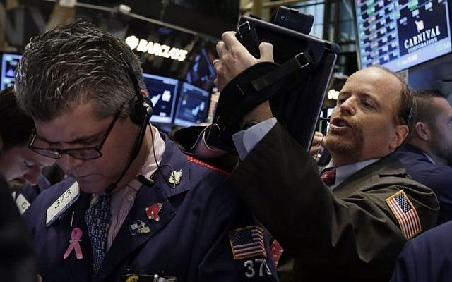 Wall Street traders on Thursday (photo credit: AP/Richard Drew) Wall Street traders on Thursday (photo credit: AP/Richard Drew)